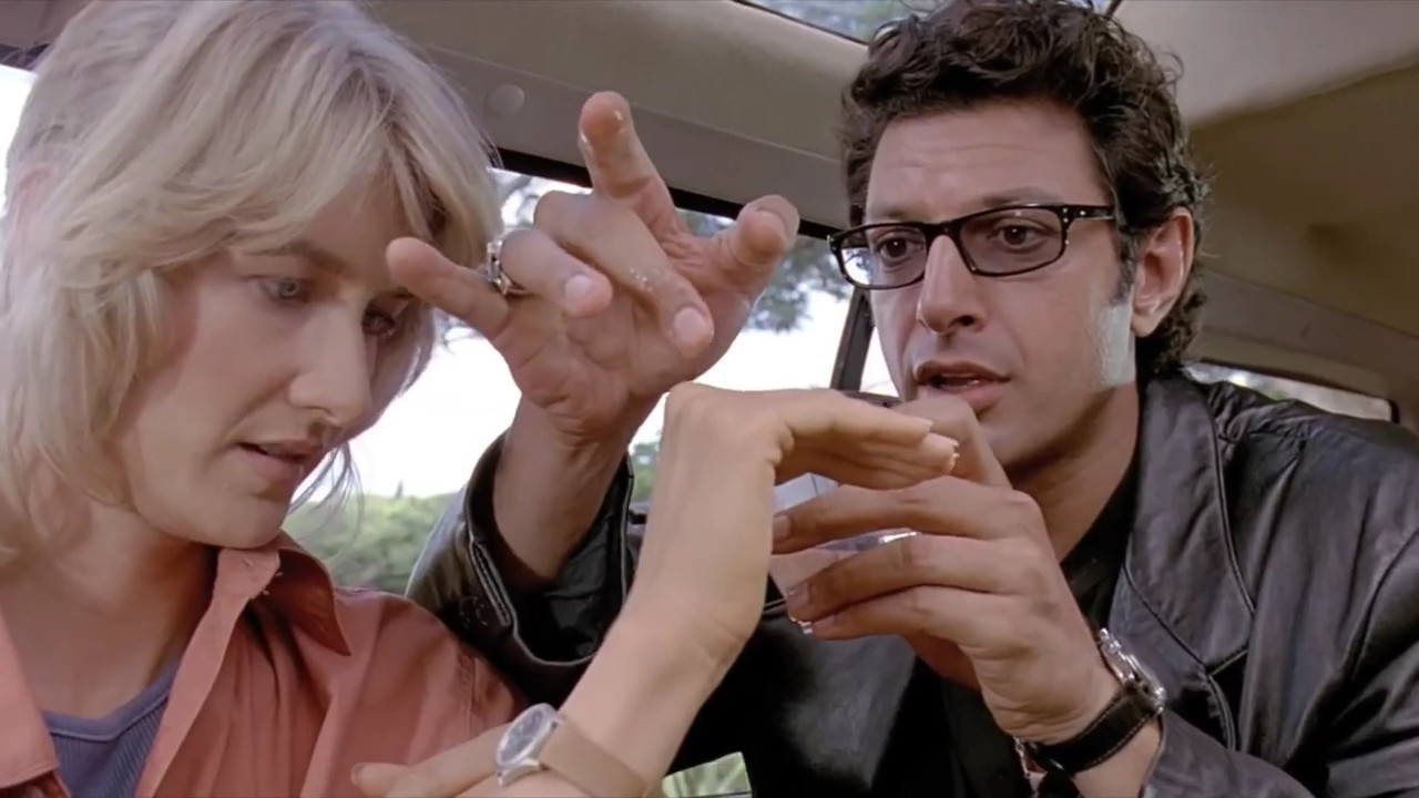 Dr Ian Malcolm demonstrating chaos theory to Dr Ellie Sadler in Jurassic Park, using a glass of water
