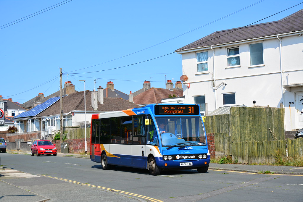 a stagecoach bus running down a street