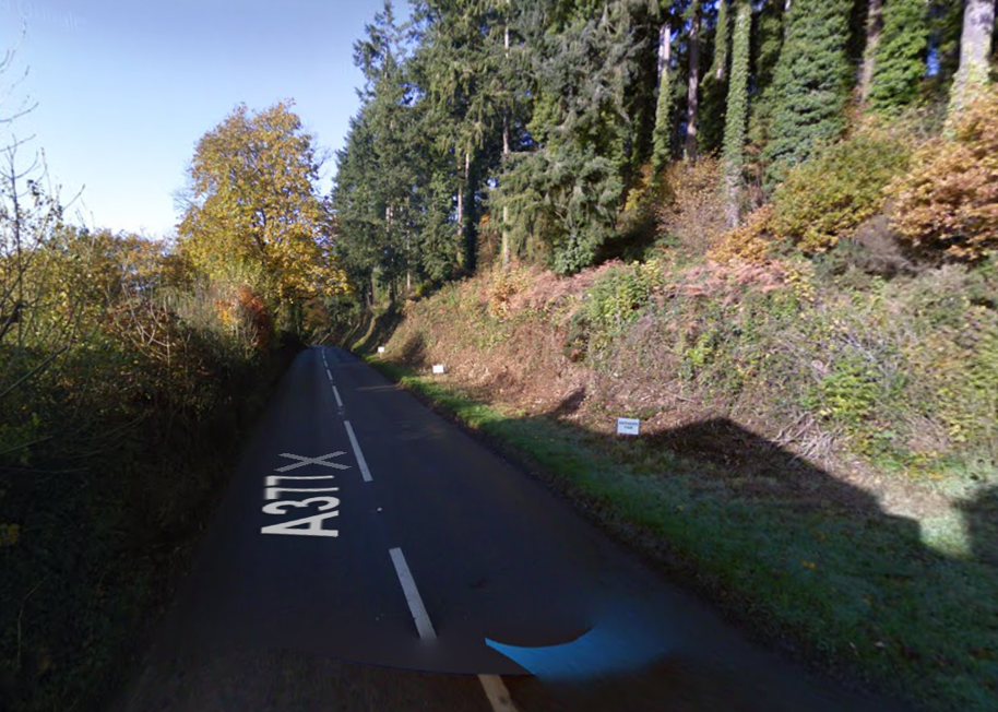 The A377 passing through the forest at Eggesford