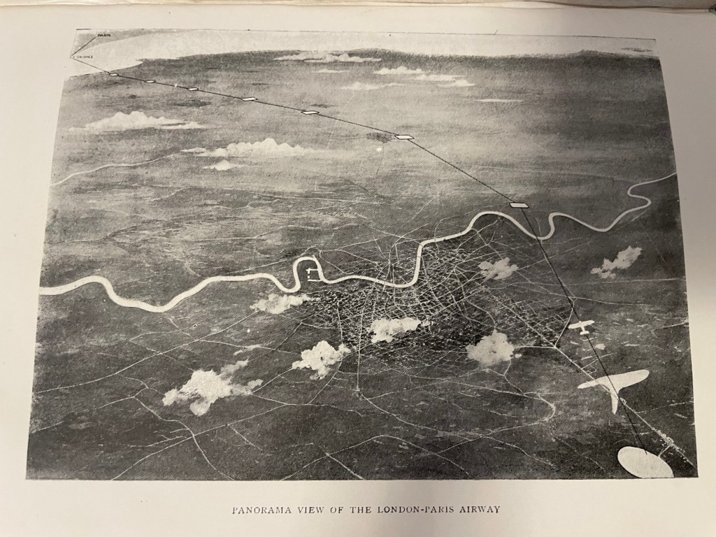 A picture in the book showing. A panorama of the planned London to Paris Airway. London is in the foreground, with a line to the English Channel of air strips