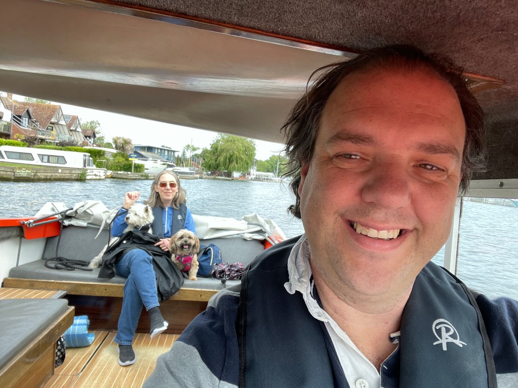 Me, my wife, and my dogs on a boat on the River Bure